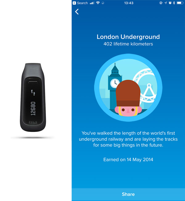 FitBit device and achievement badge.