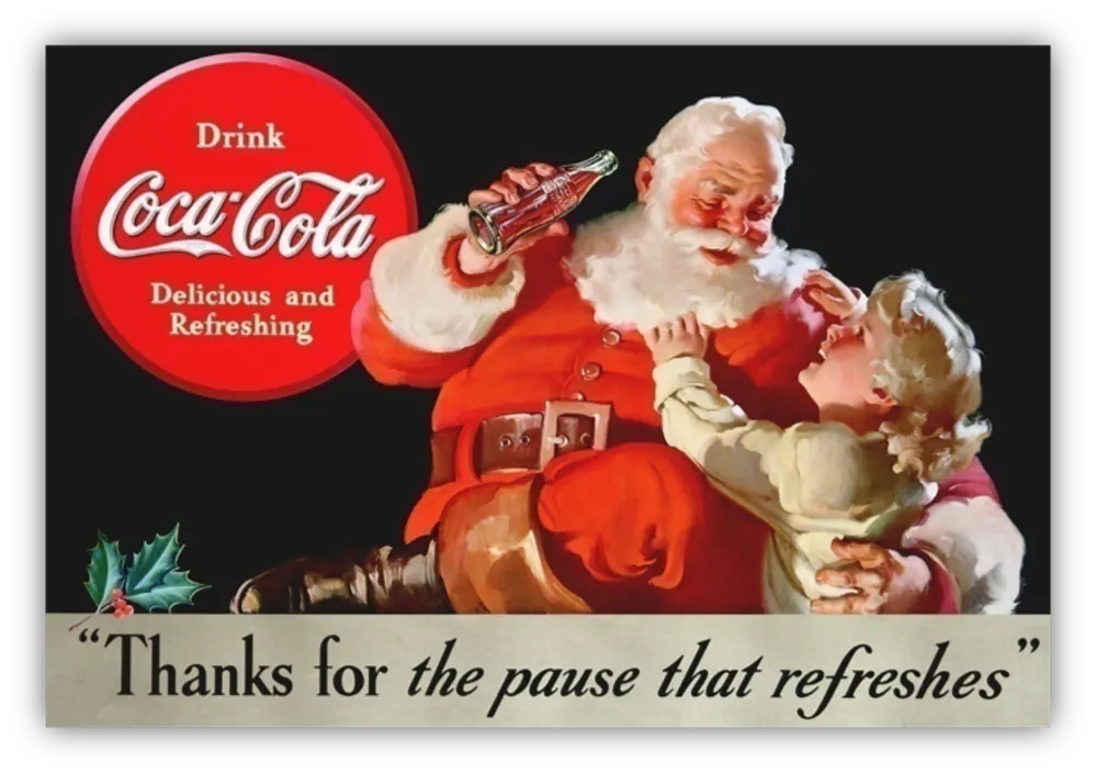Un père Noël tient une bouteille de Cocal-Cola dans une main, prêt à la boire. Et dans son autre bras, un enfant lui tend les bras. Les deux se regardent.