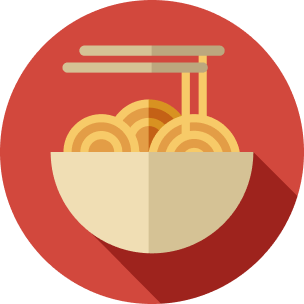 Un bol de nouilles avec des baguettes sur un cercle rouge
