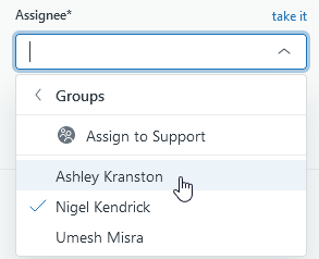 The open assignee dropdown menu is shown. From top to bottom the list shows: Groups, assign to support; Ashley Kranston (indicated by the cursor); Nigel Kendrick; Umesh Misra.