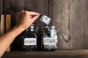 Labeled jars containing your savings